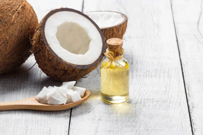 Kokosový olej nám může pomoci udržet barvu vlasů / foto: IStock